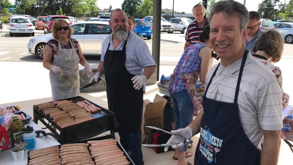 Image of people serving at a Mosaic Baptist BIg Day Out, a highlight for Mosaic's community